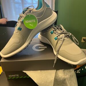 Woman’s Puma golf shoes